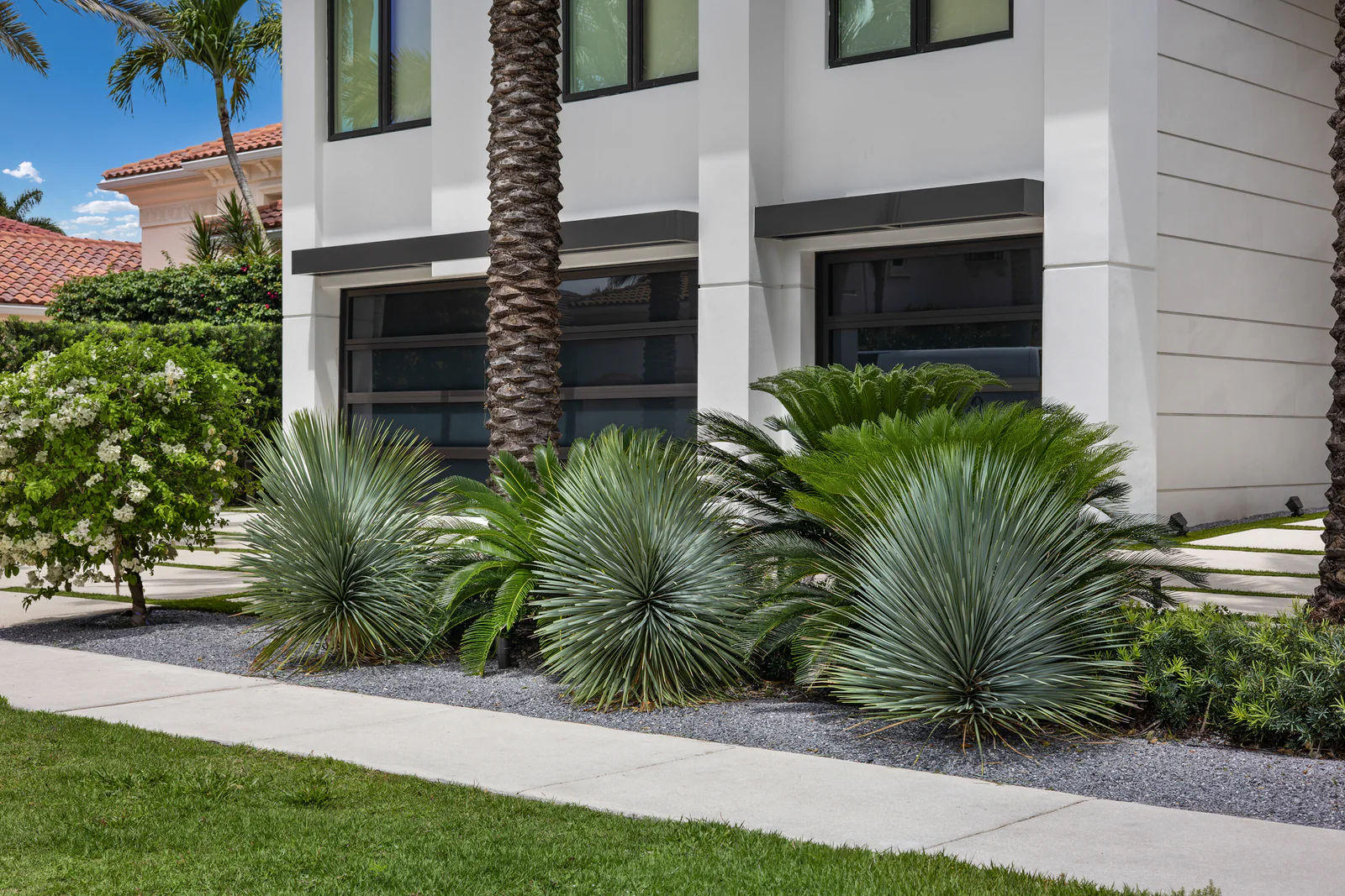 Sculptural frontage bed, by Power Group Care in Palm Beach County