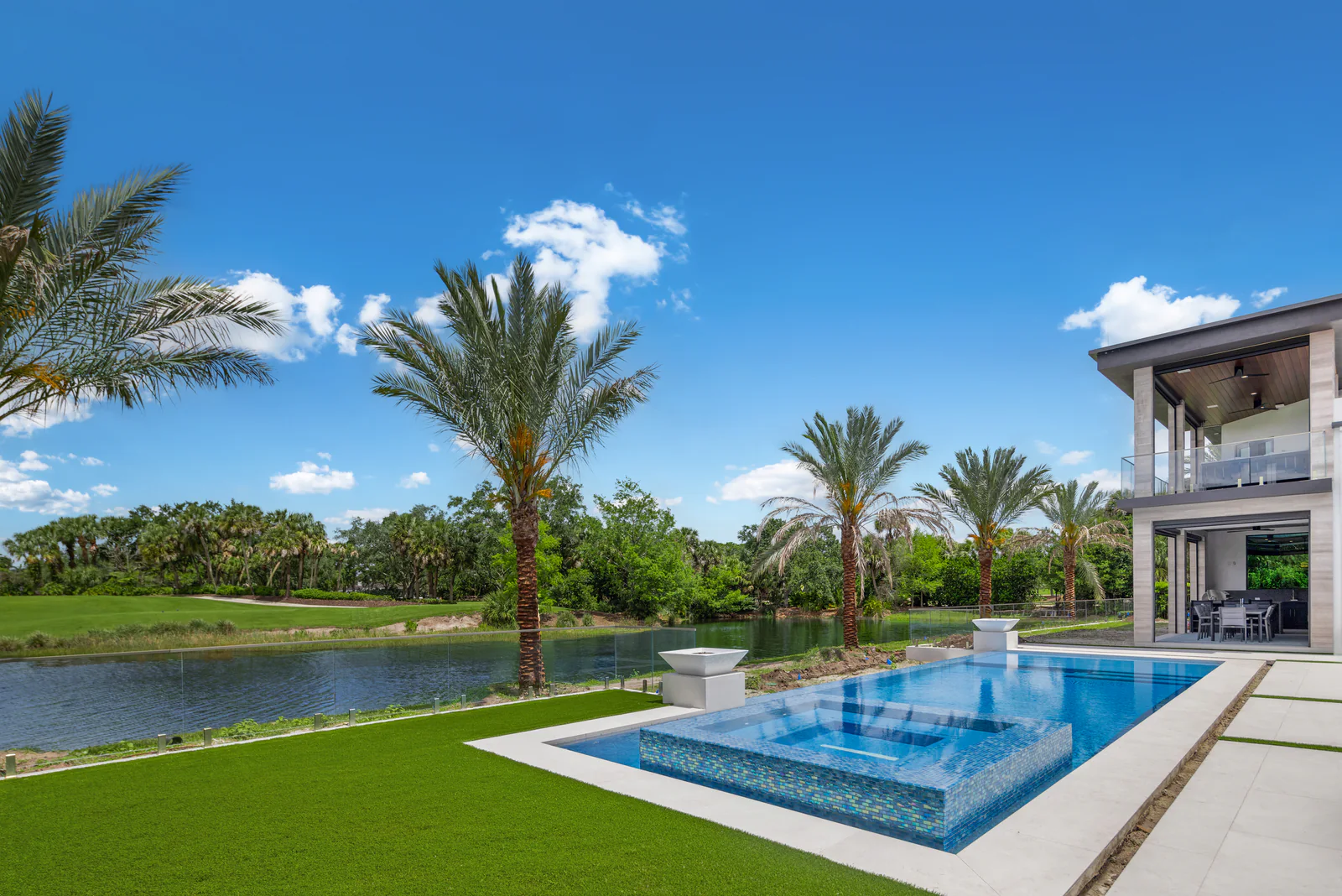 Lakeside lawn and terrace, by Power Group Care in Palm Beach County