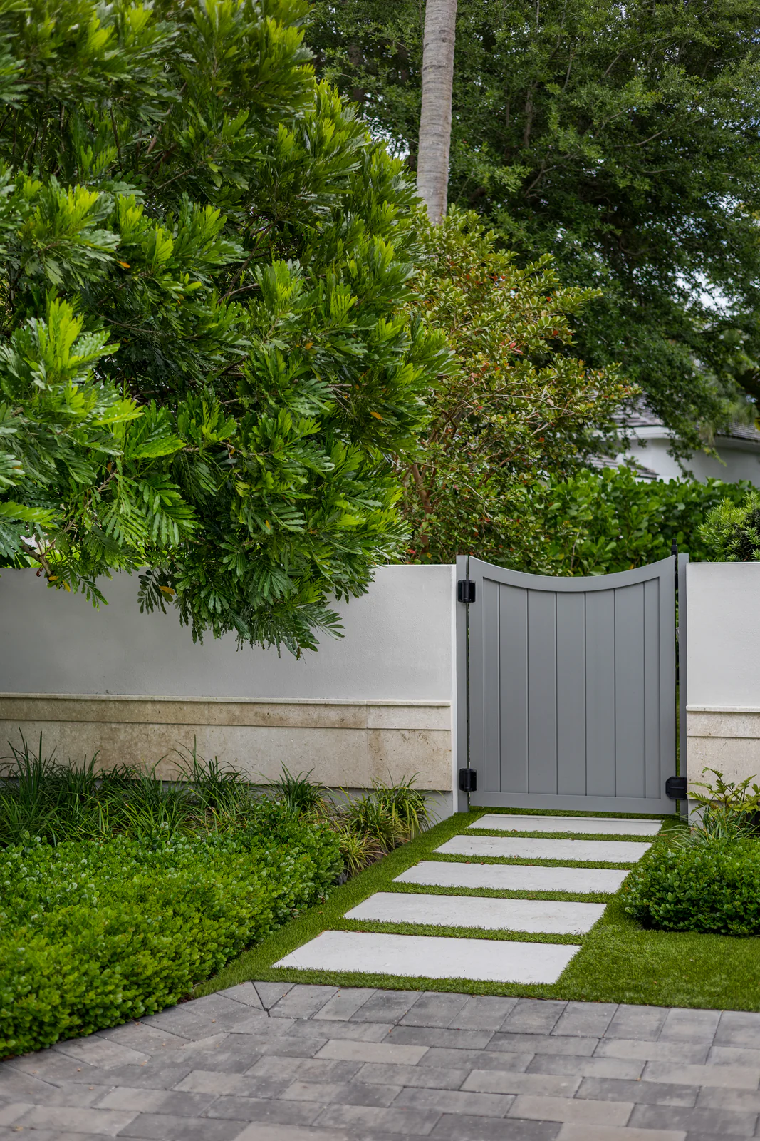 Side gate and stepping stones, by Power Group Care in Palm Beach County